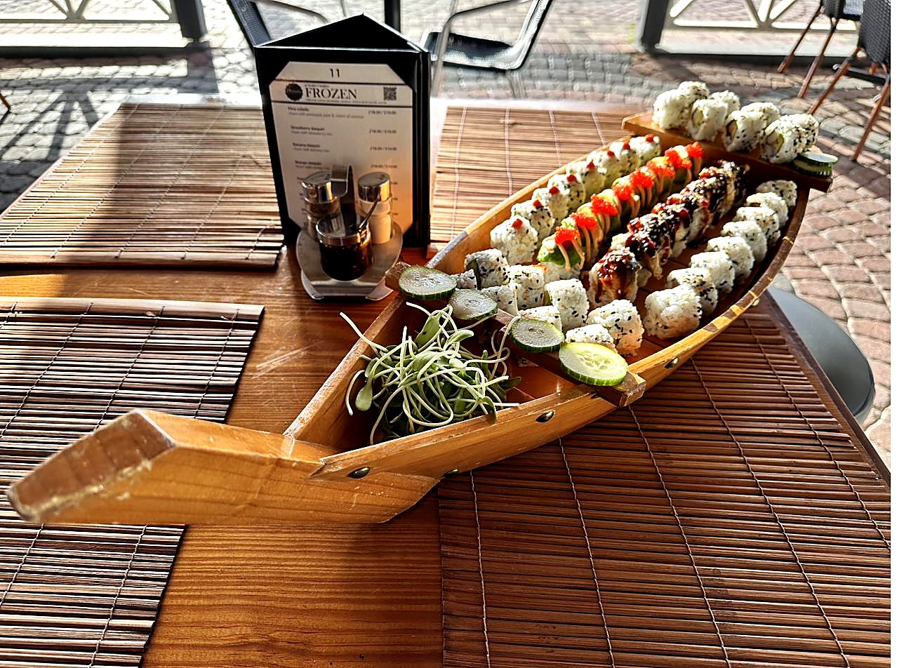 Dragon roll sushi with tempura shrimp, avocado, spicy mayo and tobiko at Aziana in Philipsburg