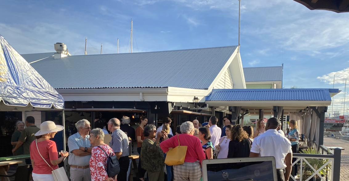 Daytime gathering on the marina square outside Aziana in Philipsburg